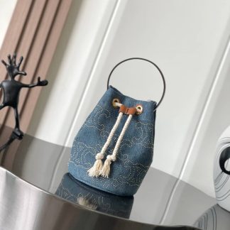 Replica Celine Teen Denim Calfskin Drawstring Bucket Bag With Triomphe Studs